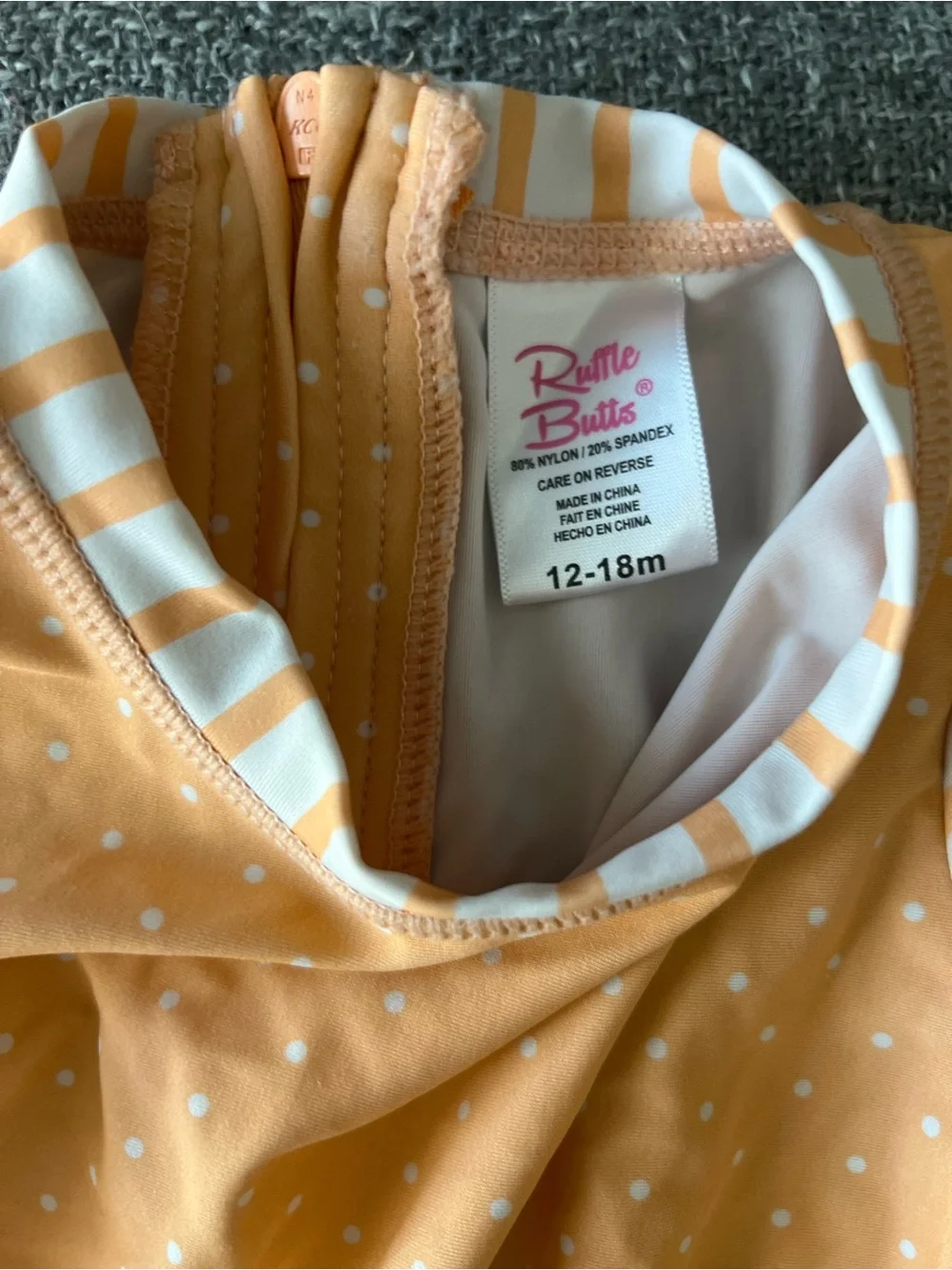 RuffleButts Melon Polka Dot One Piece